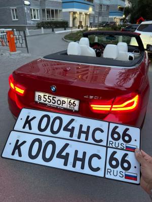 Фотография автомобиля с номером К004НС 66