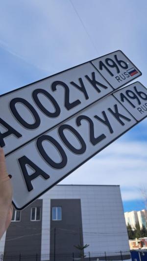 Фотография автомобиля с номером А002УК 196