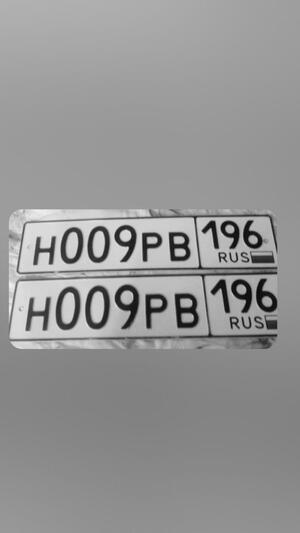 Фотография автомобиля с номером Н009РВ 196