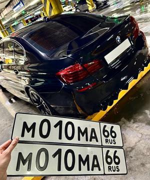 Фотография автомобиля с номером М010МА 66